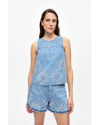 Ganni - Haut En Denim Bleu Clair En Broderie Anglaise En Taille - Lyst