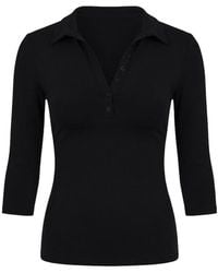 Garage - Sleek 3/4 Sleeve Polo Top - Lyst