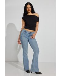 Garage - Low Rise Flare Jeans - Lyst