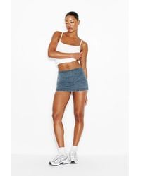 Garage - Low Rise Bodycon Denim Skort - Lyst