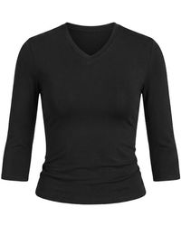Garage - Sleek High V-Neck 3/4 Sleeve Top - Lyst