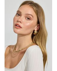 Garage - Lined Curve Button Earrings - Lyst