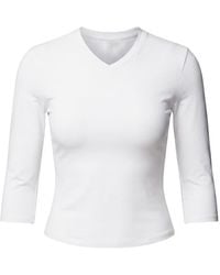 Garage - Sleek High V-Neck 3/4 Sleeve Top - Lyst