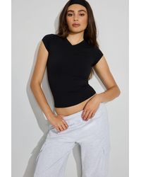 Garage - High V-Neck Sleek Top - Lyst