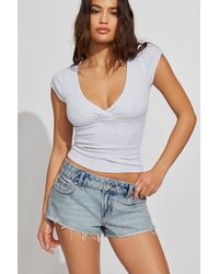 Garage - Ultra Low Rise Cuffed Denim Shorts - Lyst