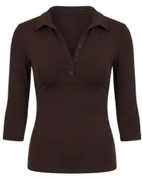 Garage - Sleek 3/4 Sleeve Polo Top - Lyst