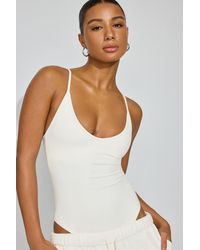 Garage - Active Plunge Bodysuit - Lyst