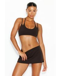 Garage - Active Low Rise A-Line Micro Skort - Lyst
