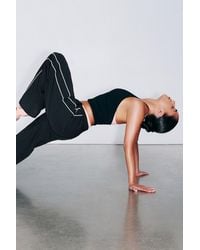 Garage - Active Wrap Halter Top - Lyst