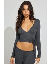 Garage - Sheer Ribbed Wrap Long Sleeve Top - Lyst