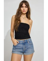 Garage - Low Rise Cuffed Denim Shorts - Lyst