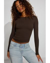 Garage - Sleek Crewneck Long Sleeve Top - Lyst