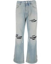 Amiri - Light Bliue Jeans With Flared Leg And Ripped Details - Lyst