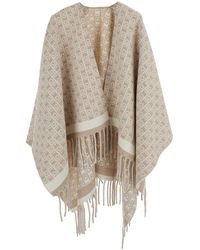 Ferragamo - Crewneck Cape With Fringed Hem And All-Over Gancini Embroidery - Lyst