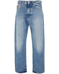 Versace - Jeans With Back Logo Patch And Faded Effect - Lyst