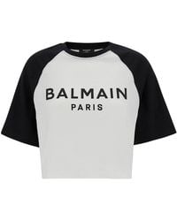 Balmain - T-Shirt Crop Con Stampa Logo Lettering E Maniche A Contrasto I - Lyst