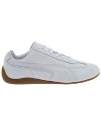 PUMA - Low Top Sneakers With Embossed Logo - Lyst
