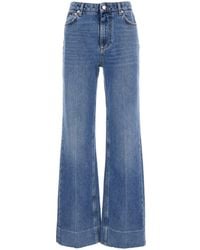 Dolce & Gabbana - Jeans Con Gamba Ampia E Patch Logo Sul Retro - Lyst