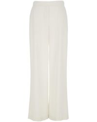 P.A.R.O.S.H. - Pants With Wide Leg And Elastic Rear Waist - Lyst