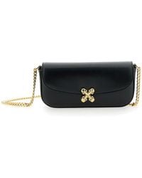 McQueen - Borsa a tracolla Skull Flower piccola in pelle nera - Lyst
