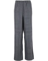 TOTEME - Pants With Elastic Waist And All-Over Logo Print - Lyst