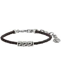 Versace - Bracelet With Metal Plate And Pendant Detail - Lyst