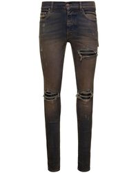 Amiri Jeans skinny mx1 denim indigo effetto vintage in misto cotone uomo - Grigio