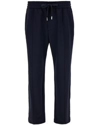 Dolce & Gabbana - Blue Joggers Pants With Drawstring And Logo Patch In Stretch Polyamide Man - Lyst
