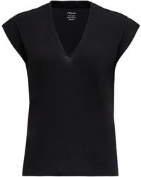 FRAME - T-shirt nera di cotone con scollo a v donna - Lyst