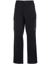 C.P. Company - Cargo Pants With Two Cargo Pockets On The Front And Logo Plaque On The Side - Lyst