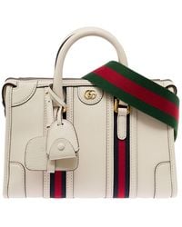 Gucci - Medium Duffle Bag With Gg Logo And Web Motif - Lyst