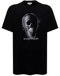 Alexander McQueen T-shirt nera di cotone con stampa logo uomo - Nero