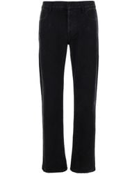 McQueen - Jeans With Logo Patch On The Rear And Worn Out Effect - Lyst