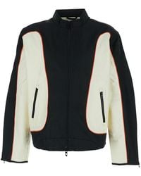 DIESEL - And Jacket With Logo On The Sleeve And Bicolor Design - Lyst