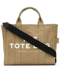 Marc Jacobs - Shopper tote the traveller in canvas khaki con stampa logo - Lyst