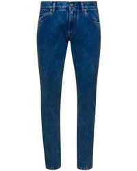Dolce & Gabbana - Jeans a cinque tasche con banda laterale logo in denim di cotone uomo - Lyst