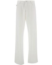 Versace - White Five-pocket Jeans With Logo Patch In Cotton Denim Man - Lyst
