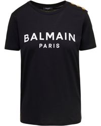 Balmain T-shirt con lettering a contrasto e dettaglio con bottoni in cotone donna - Nero