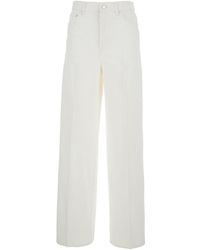 TOTEME - Wide Leg Jeans With Logo Patch - Lyst