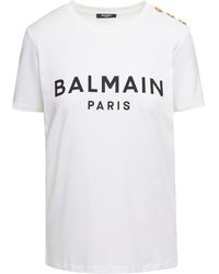 Balmain T-shirt con lettering a contrasto e dettaglio con bottoni in cotone donna - Bianco