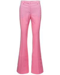 Versace - Flare Pants With Tonal Logo Lettering - Lyst