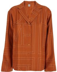 TOTEME - Shirt With Notched Collar And All-Over Logo Print - Lyst