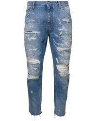 Dolce & Gabbana - Jeans con strappi e targhetta logo in denim di cotone azzurro uomo - Lyst