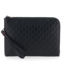 Gucci - 'Emblem' Clutch Bag With All-Over Embossed Gg Logo - Lyst