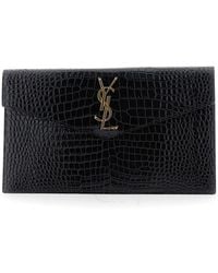Saint Laurent - Clutch Bag With Logo Plaque On The Front And All-Over Crocodile Effect - Lyst