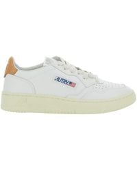 Autry - Sneakers basse bianche con patch logo - Lyst