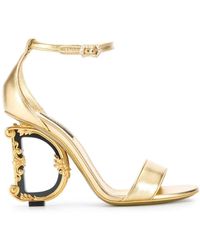 Dolce & Gabbana - Sandali 'barocco' con tacco logo in pelle dorata donna - Lyst
