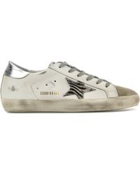 Golden Goose - Sneakers Super Star Classic in pelle bianca - Lyst