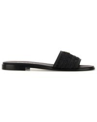 Prada - Slippers in rafia nera - Lyst