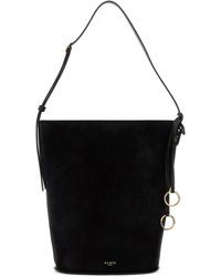 Alaïa - Borsa a secchiello in pelle scamosciata nera - Lyst
